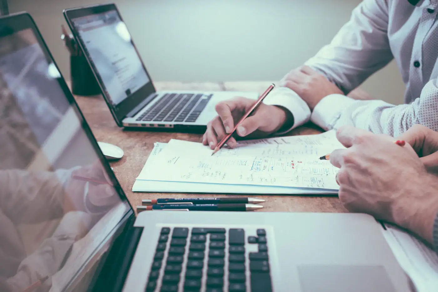 A finance team buried in supplier invoices